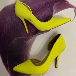 Lightly distressed yellow pumps